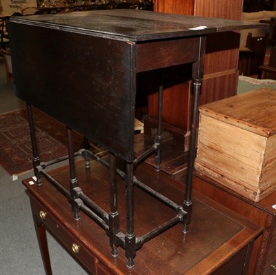 Lot 1183 - George III style mahogany Sutherland table