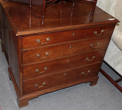 Lot 1190 - A George III mahogany and oak lined four drawer straight fronted chest of drawers