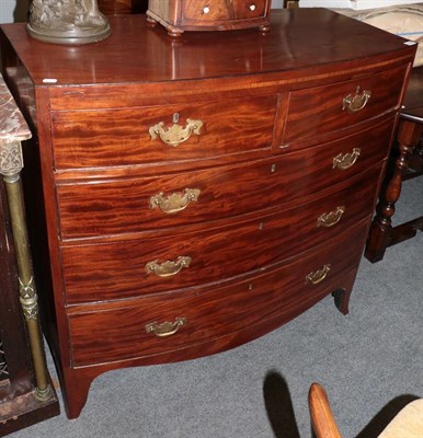 Lot 1198 - A George III mahogany bow fronted chest