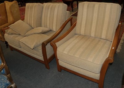 Lot 1202 - A modern ash framed two-seater sofa and matching armchair