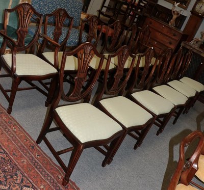Lot 1206 - A set of twelve reproduction Hepplewhite style dining chairs