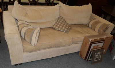 Lot 1208 - A modern three-seater sofa in pale corduroy fabric
