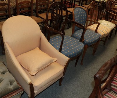 Lot 1212 - An early 20th century tub shaped armchair, two carver chairs and two dining chairs (5)