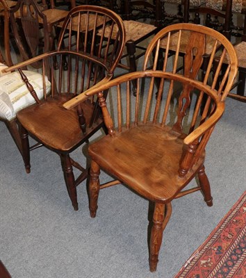 Lot 1213 - A 19th century elm Windsor armchair and another similar (2)
