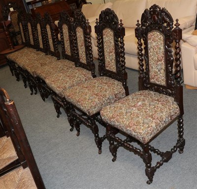 Lot 1216 - A set of ten Victorian carved oak dining chairs, circa 1880, including two carvers, recovered...