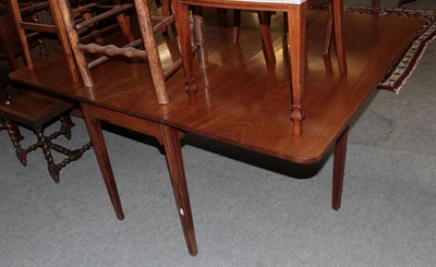 Lot 1218 - A George III mahogany drop leaf dining table