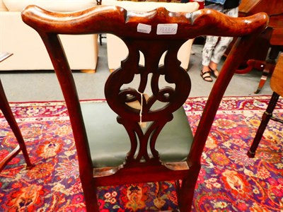 Lot 1222 - A pair of George III mahogany dining chairs with cream close-nailed leather seats
