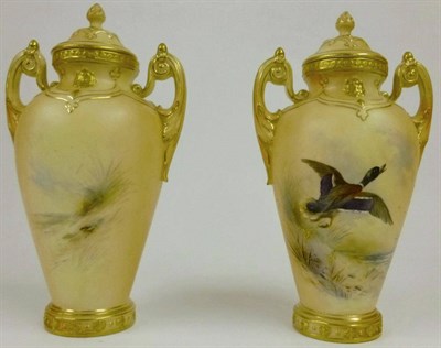 Lot 44 - A Pair of Graingers Royal China Works Baluster Vases and Covers, circa 1900, with scroll...