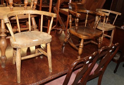 Lot 1250 - An oak captain's chair, child's example and a pair of dolls' chairs (4)
