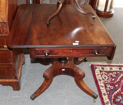 Lot 1267 - A Regency mahogany sofa table raised on sabre legs