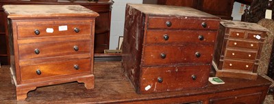 Lot 1271 - A Victorian mahogany four drawer chest and two reproduction miniature chests