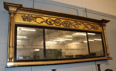 Lot 1281 - A Regency gilt and gesso triple plate over mantel mirror, of architectural form