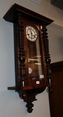 Lot 1283 - A mahogany cased wall clock with enamel dial
