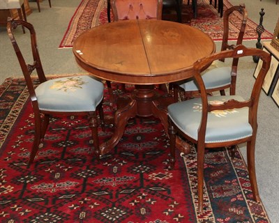 Lot 1318 - A set of three Victorian walnut salon chairs