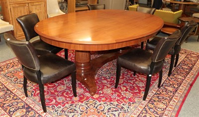 Lot 1338 - A bespoke cherry wood oval twin pedestal dining table, 234cm long and a set of six halo leather and