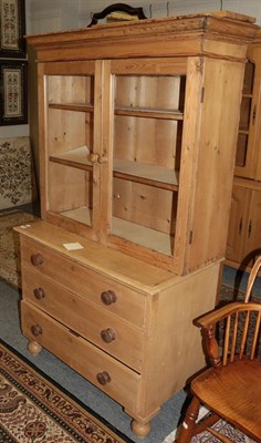 Lot 1346 - A Victorian pine three drawer chest with associated bookcase top