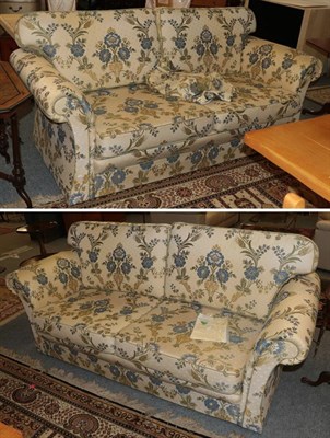 Lot 1349 - A pair of Peter Guild sofas recovered and with interior fillings by J McCourt, circa 2013