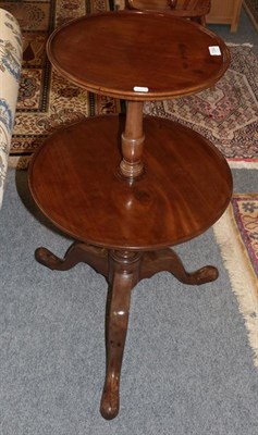 Lot 1354 - A George III mahogany two tier dumb waiter, 90cm high