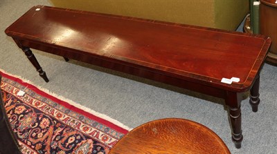 Lot 1356 - A mahogany and rosewood cross banded hall bench on turned legs, 153cm wide