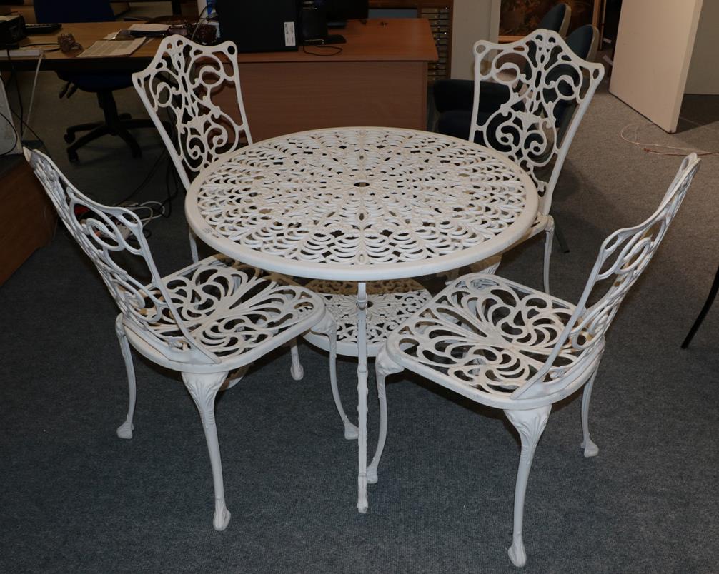 Lot 1372 - A Victorian style aluminium and white painted garden table and four chairs