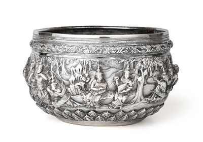 Lot 2146 - A Burmese Silver Bowl, Dated 1903, circular, the sides cast and chased in high relief with...