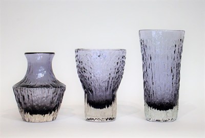 Lot 21 - Whitefriars - Geoffrey Baxter: Three Textured Range Glass Vases, in lilac, pattern...