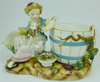 Lot 60 - A John Bevington Porcelain Figure of a Girl, circa 1880, sitting holding a posy and a basket,...