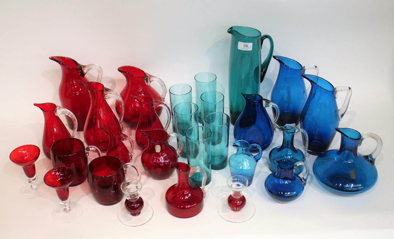 Lot 39 - Whitefriars - A Group of Glass Jugs, Candlesticks and Mugs, in ruby, blue and green, various...