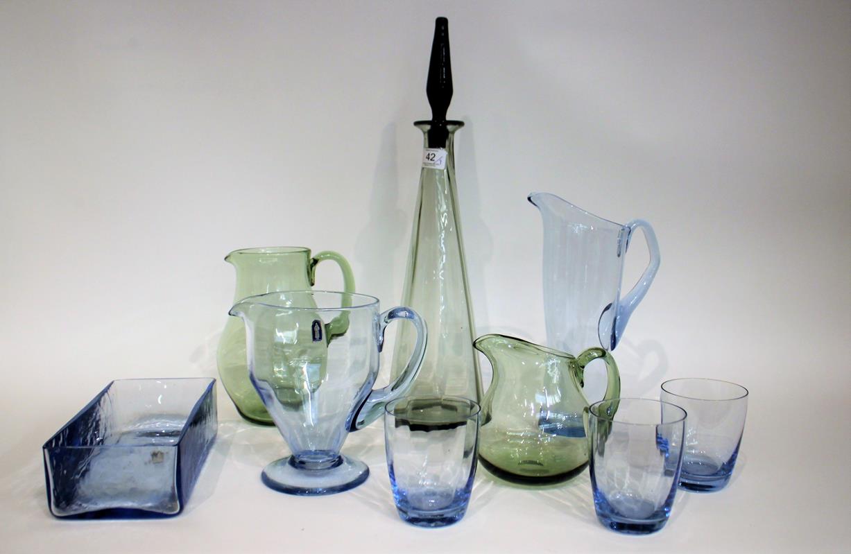 Lot 42 - Whitefriars - A Lemonade Jug and Three Tumblers, in sapphire blue, 9.5cm and 27cm a water jug...