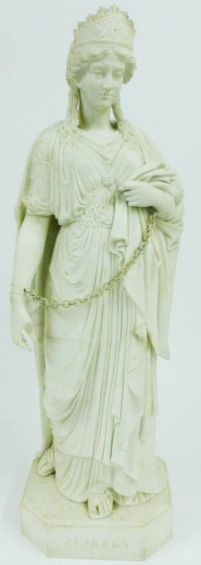 Lot 62 - A Parian Figure of Zenobia, circa 1870, standing wearing a scroll moulded crown and flowing...