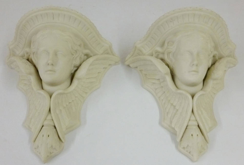 Lot 63 - A Pair of Parian Wall Brackets, circa 1870, supported by winged angel masks, 20.5cm high