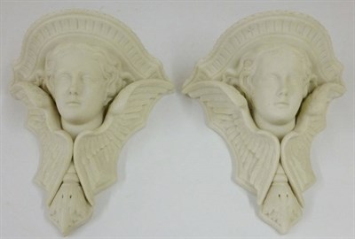 Lot 63 - A Pair of Parian Wall Brackets, circa 1870, supported by winged angel masks, 20.5cm high