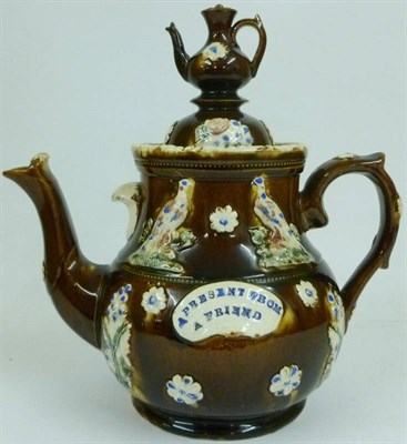 Lot 68 - A Measham Type Bargeware Teapot and Cover, late 19th century, of baluster form with coffee pot...