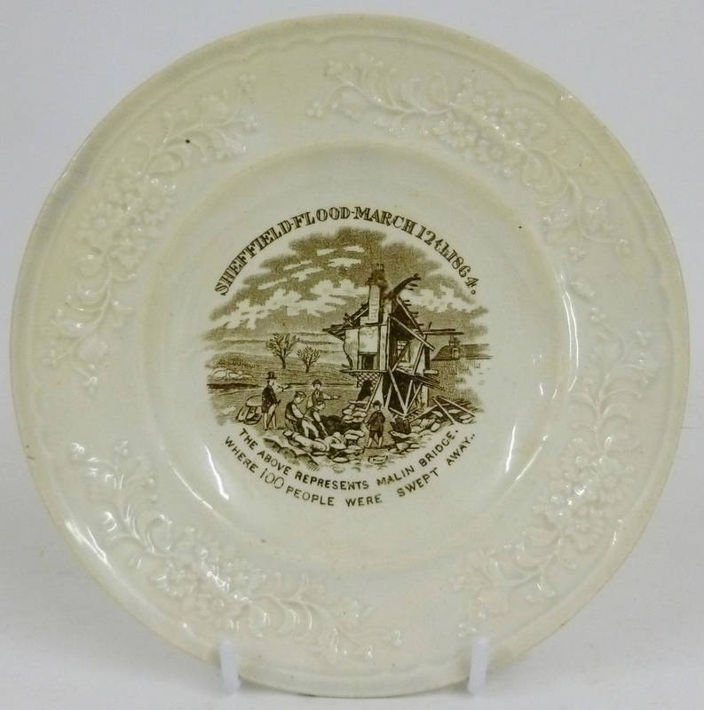 Lot 72 - A Staffordshire Pottery Tea Plate, circa 1864, printed in brown with SHEFFIELD FLOOD MARCH 12TH...
