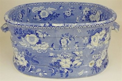 Lot 80 - A Staffordshire Semi China Footbath, mid 19th century, of coopered oval form with scroll...