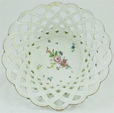 Lot 103 - A Chelsea Basket, circa 1760, with lattice moulded sides, painted with flower spray and sprigs,...