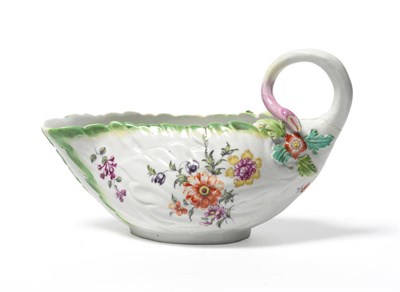 Lot 104 - A Chelsea Leaf Moulded Sauceboat, circa 1760, painted with floral sprays and sprigs, branch and...
