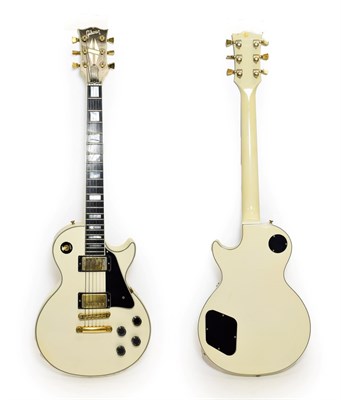 Lot 3022 - Gibson Les Paul Custom Guitar cream with black scratchplate, two humbucker pickups, three...