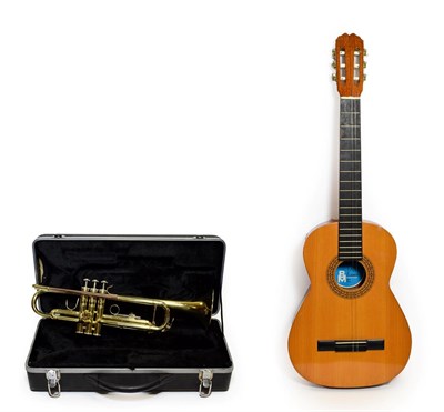 Lot 3050 - Trumpet Prelude By Bach no.AD31906024 cased together with Classical Guitar labelled 'B&M...