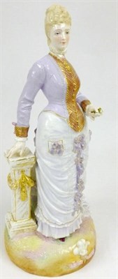 Lot 112 - A French Porcelain Figure of the Princess of Wales, late 19th century, standing wearing a lilac...