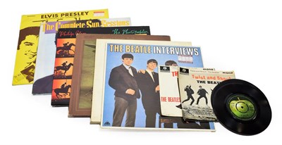 Lot 3127 - The Beatles Vinyl Records LPs:The White Album with poster and four photographs, The Beatle...