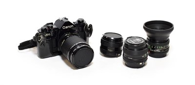 Lot 3195 - Canon A1 Camera no.2064443, with FD lenses: f3.5-4.5 35-105mm, f2.8 35mm, f2.8 28mm and f1.8 50mm