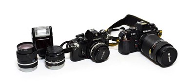 Lot 3209 - Nikon EM Camera With Series E Lens f1.8 50mm together with Series E lenses f2.8 100mm and f2.8...