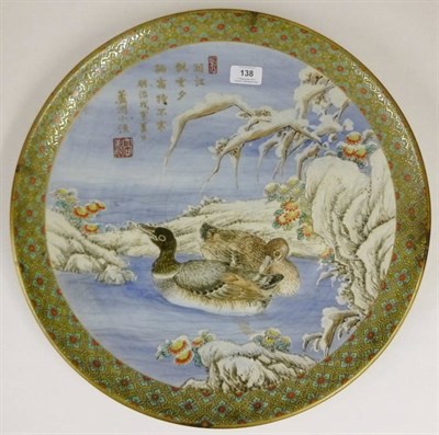 Lot 138 - A Japanese Porcelain Charger, early 20th century, painted with ducks in a wintery landscape and...