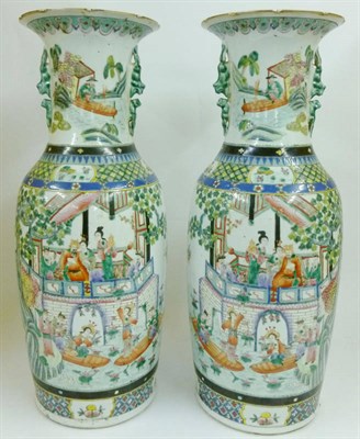 Lot 147 - A Pair of Cantonese Porcelain Baluster Vases, bear Tongzhi marks and possibly of the period,...