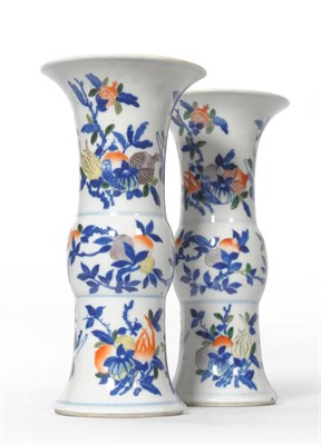Lot 172 - A Pair of Chinese Porcelain Gu Vases, the upper register decorated with three fruiting sprigs...