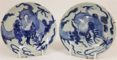 Lot 174 - A Pair of Chinese Porcelain Saucer Dishes, 18th century, painted in underglaze blue with...