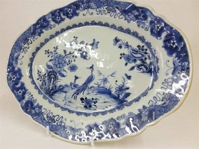 Lot 175 - A Chinese Porcelain Oval Platter, mid 18th century, painted in underglaze blue with pheasants...