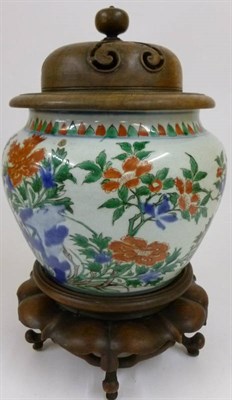 Lot 180 - A Chinese Porcelain Three Colour Vase, 17th century, of compressed ovoid shape, with pointed...