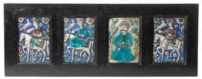 Lot 185 - Four Qajar Faience Tiles, 19th century, three moulded as figures on horseback holding hunting...